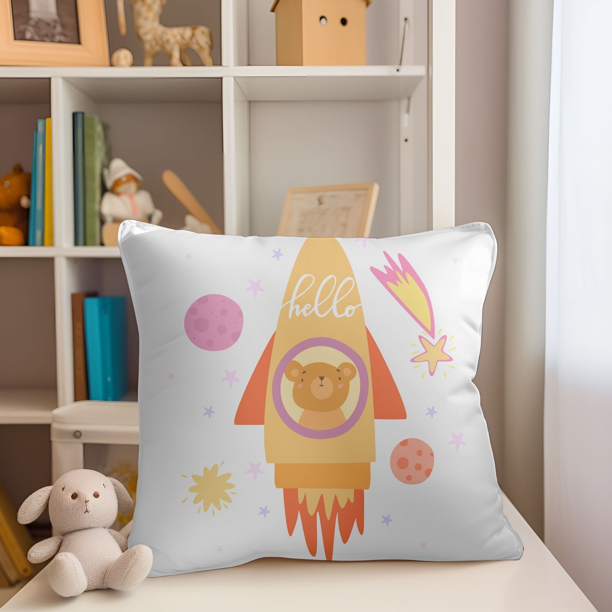 Cozy rocket-shaped baby pillow adorned with an adorable bear illustration.