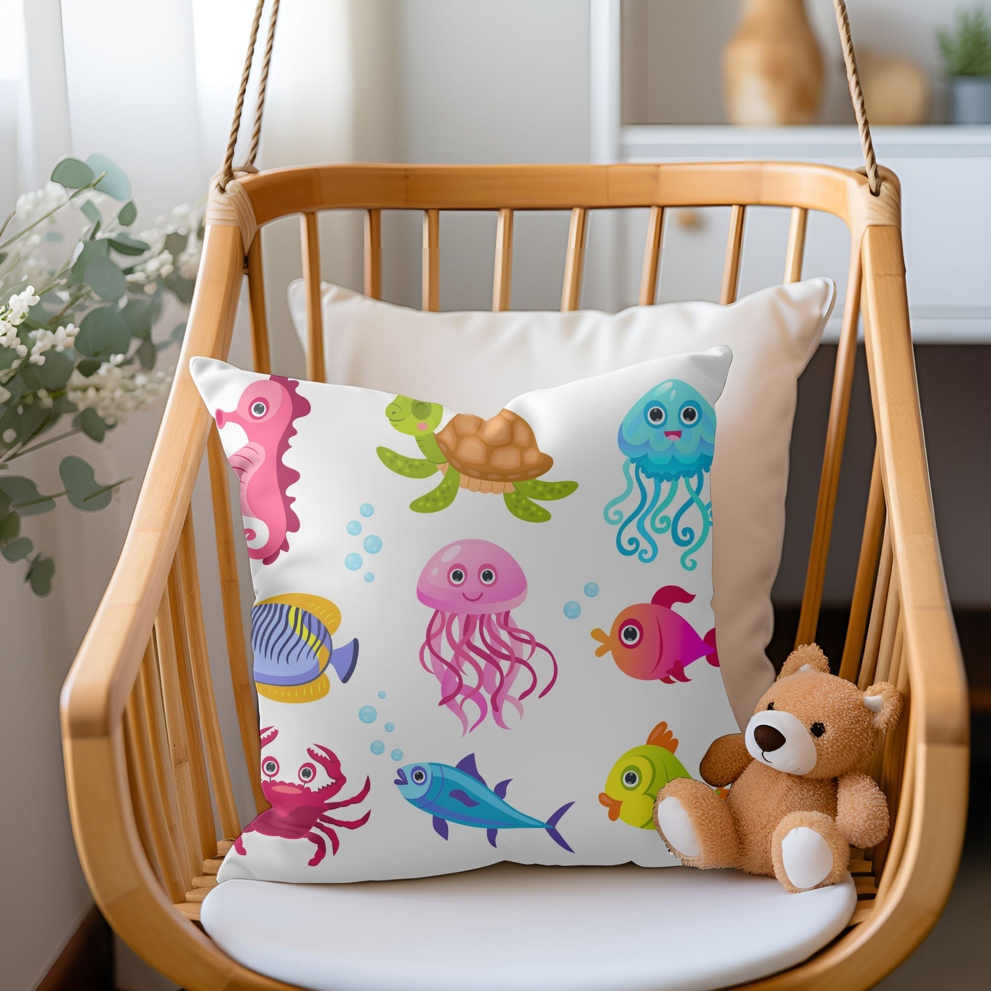 Kids pillow with a playful sea creatures pattern.