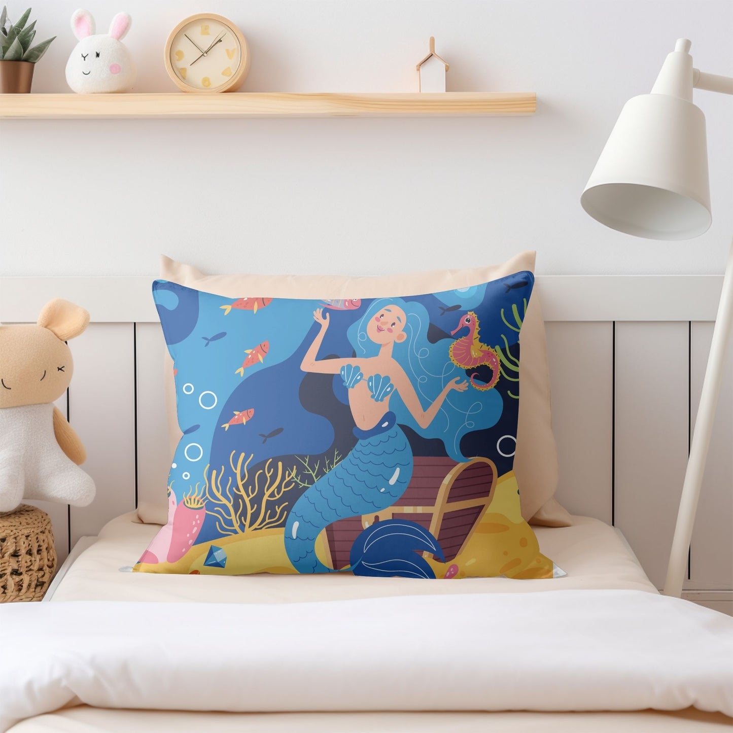 Girls room pillow featuring a whimsical mermaid pattern.