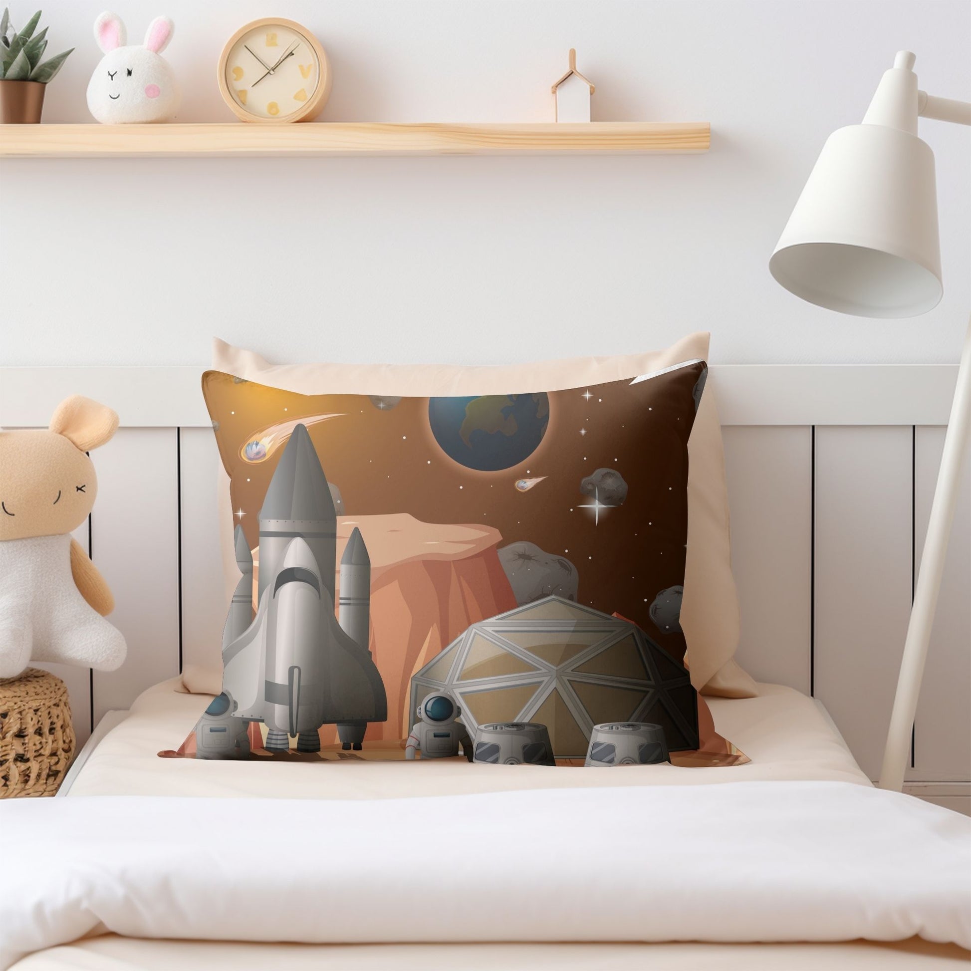 Cozy spacecraft pattern pillow perfect for young space explorers' comfort.