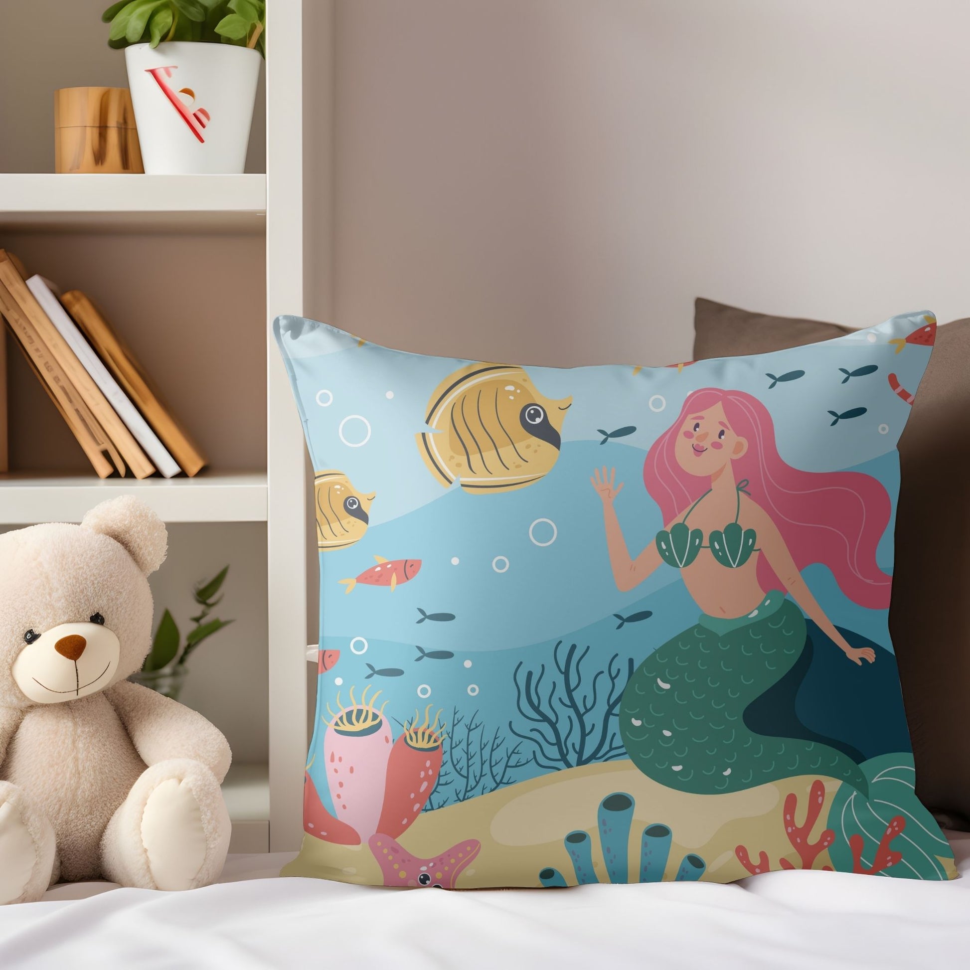 Soft pillow featuring enchanting mermaid print for girls' rooms.