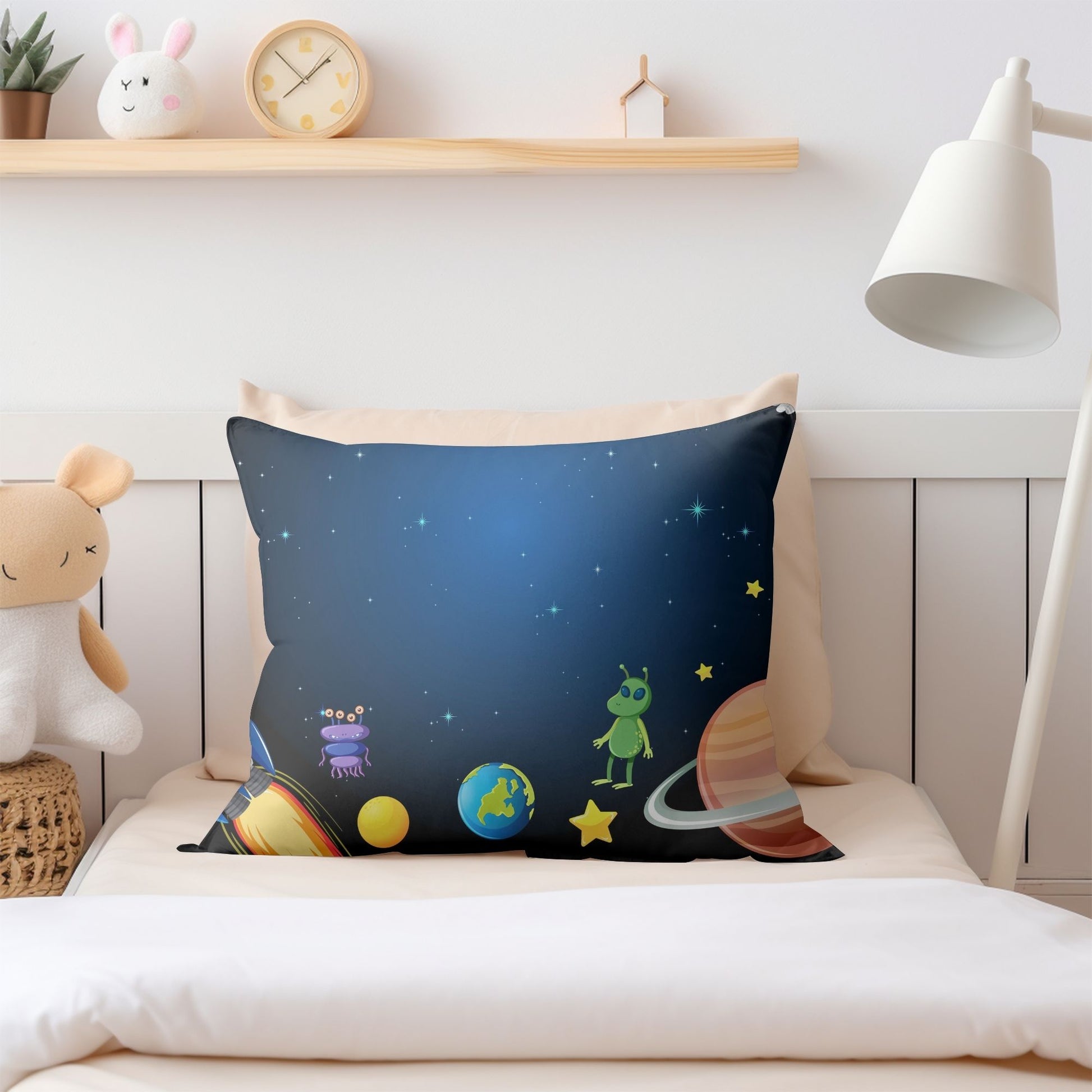 Kids pillow featuring cute aliens pattern for playful dreams.