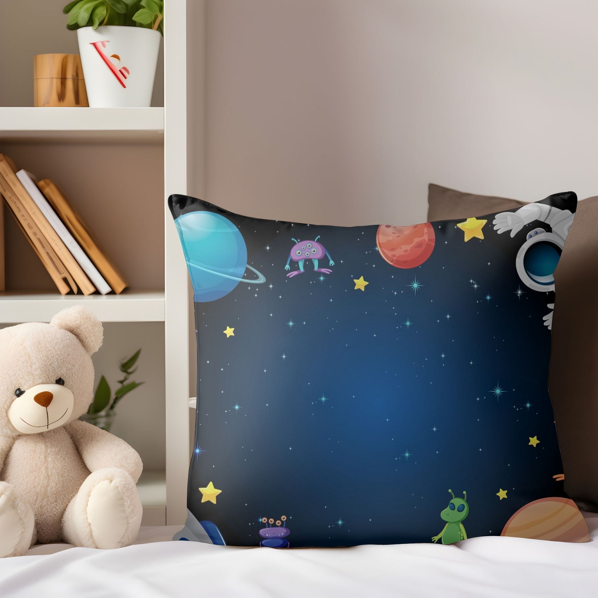 Soft pillow adorned with adorable aliens pattern for children's rooms.