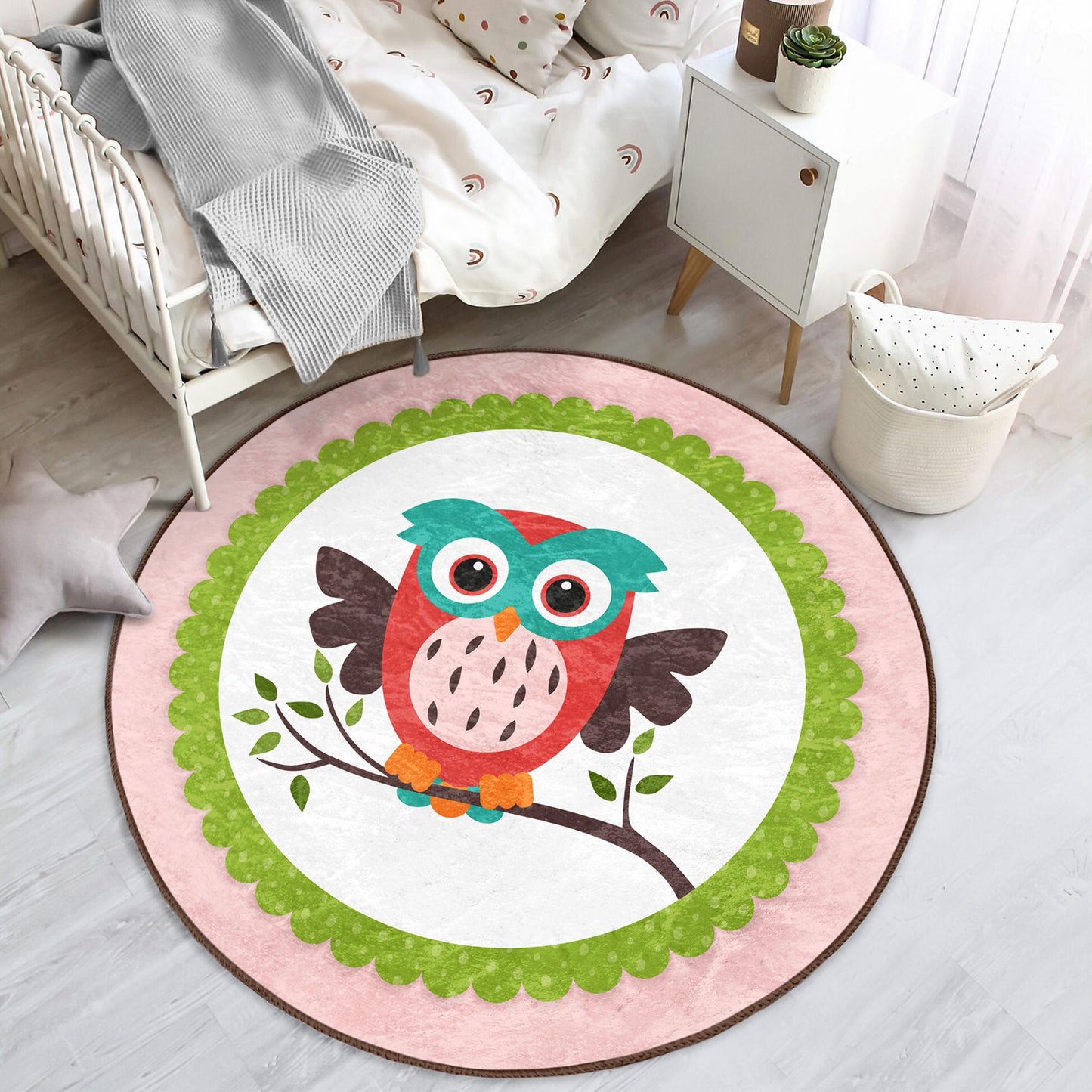 Fun-filled rug featuring adorable baby owls for nursery ambiance.