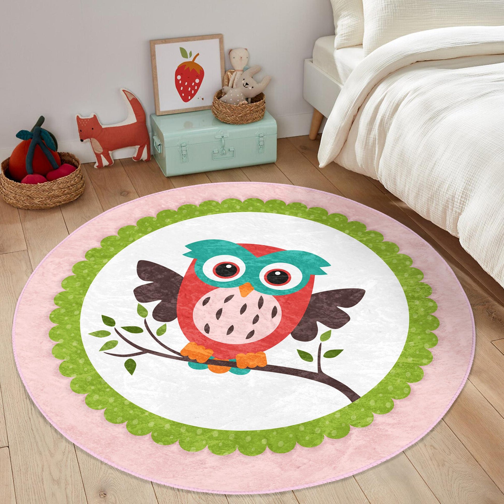 Charming baby room rug adorned with sweet baby owl prints.