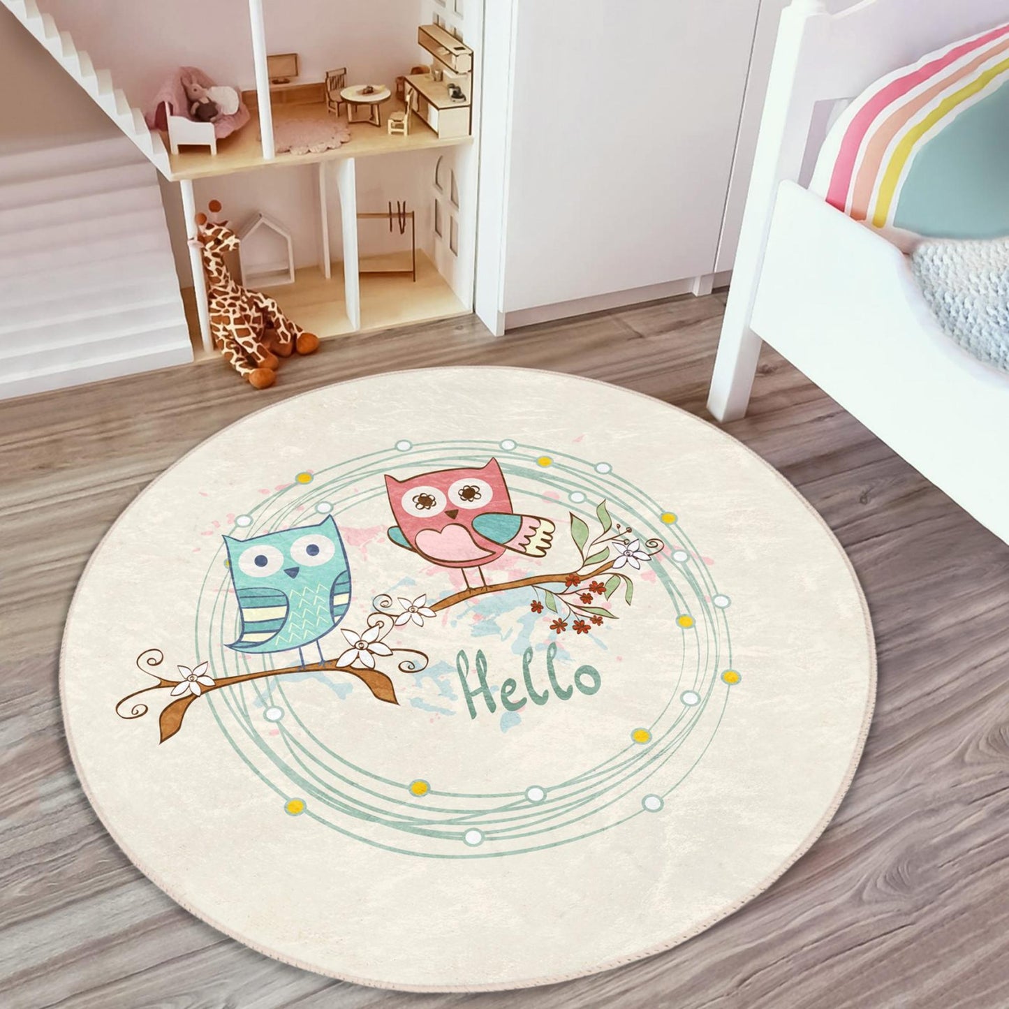 Charming kids rug adorned with sweet owls resting on the tree.