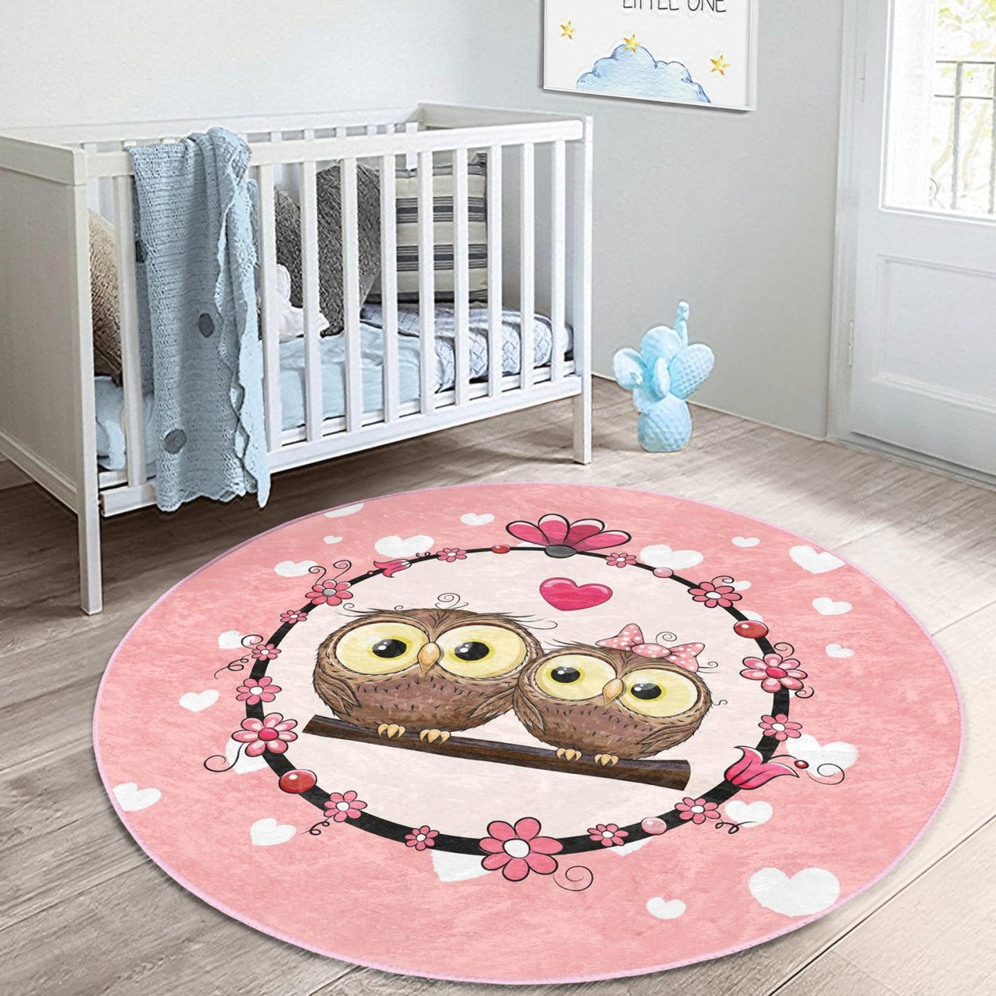 Whimsical kids rug showcasing adorable pink owl loves for playful decor.