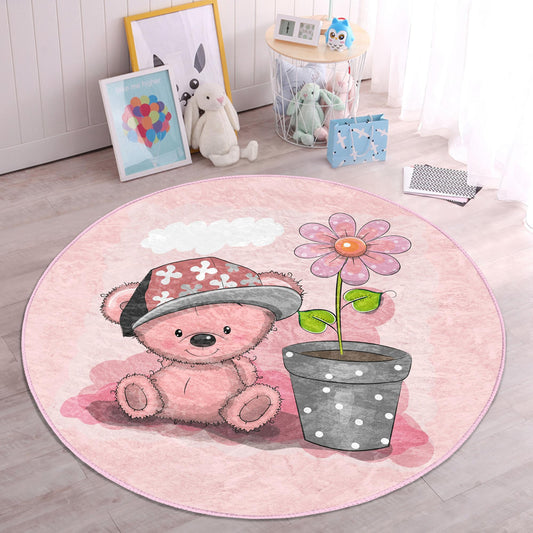 Girls room rug featuring a pink bear design for a charming touch.