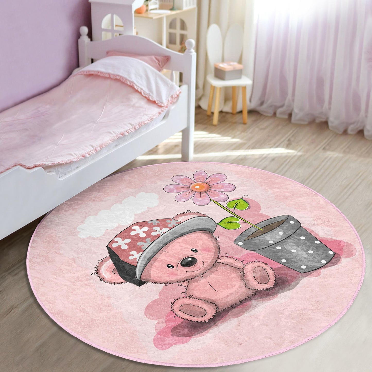 Sweet bear-themed rug in pink perfect for adding charm to girls' spaces.