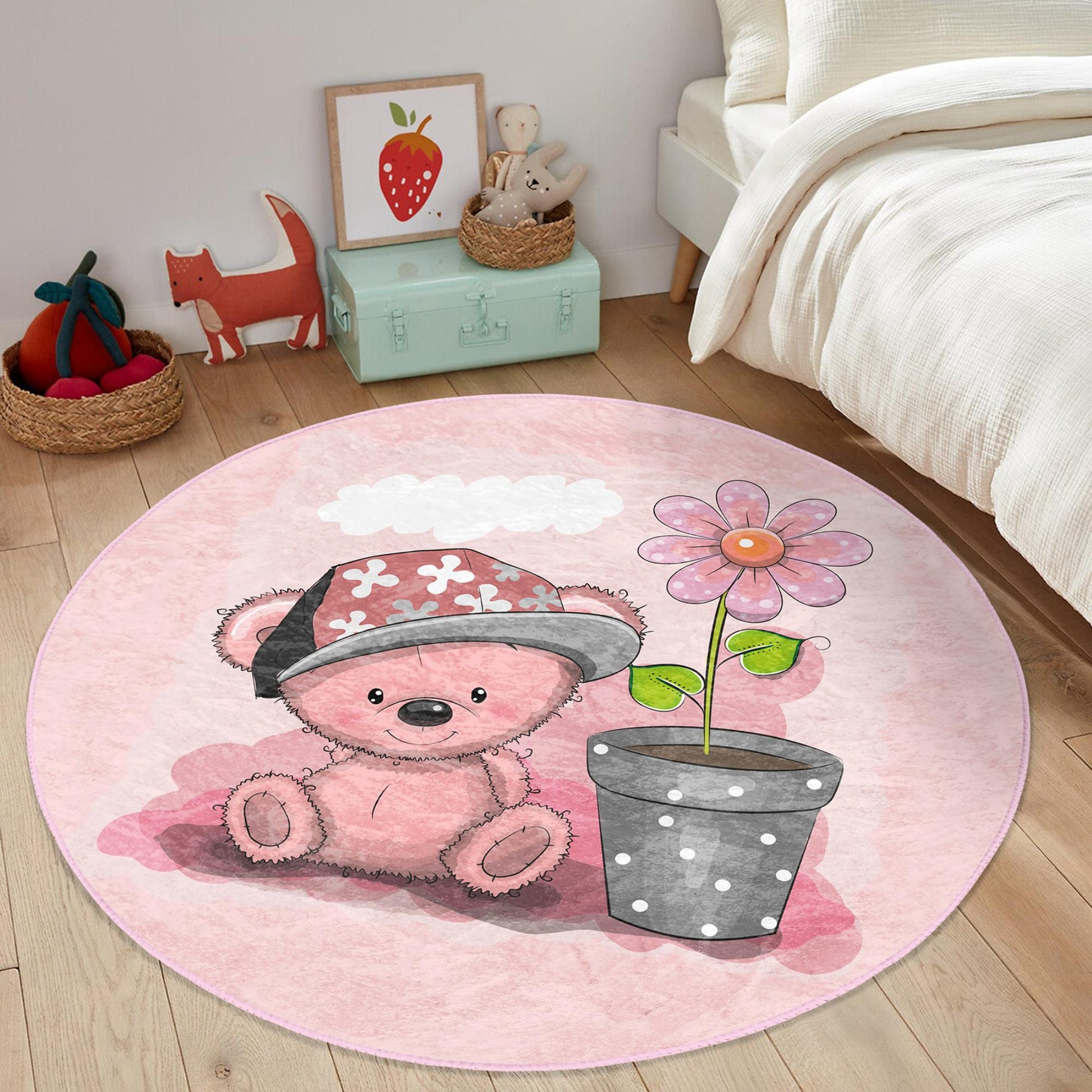 Charming girls rug adorned with a sweet pink bear design.