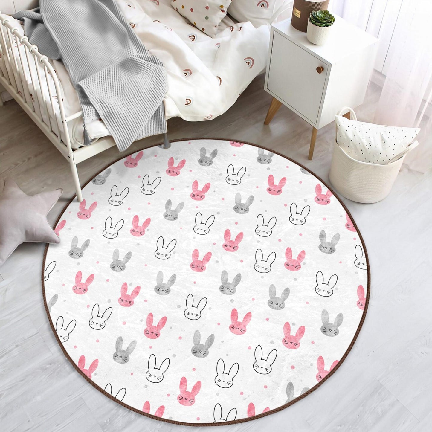 Soft and cozy rug adorned with adorable rabbit prints for children's spaces.