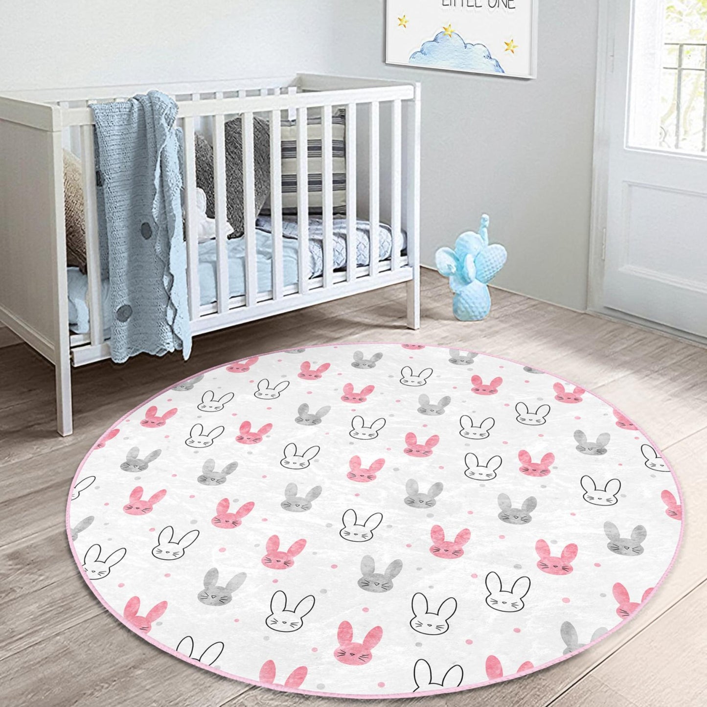 Fun-filled rug featuring lovable rabbit designs for children's room ambiance.